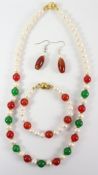Suite of freshwater pearls with green jade and cornelian Condition Report <a