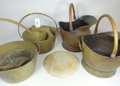 Two brass jam pans, brass and copper coal helmets,