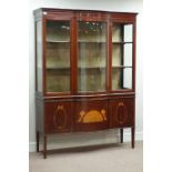 Edwardian inlaid mahogany break bow front display cabinet, three glazed doors above three cupboards,