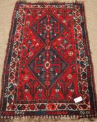 Iranian Shiraz red and blue ground rug,