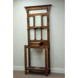 Early 20th century oak hall stand, hinged compartment, with bevelled mirror back, W82cm, H189cm,