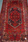 Persian Hamadan red ground rug, 261cm x 140cm Condition Report <a href='//www.