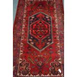 Persian Hamadan red ground rug, 261cm x 140cm Condition Report <a href='//www.