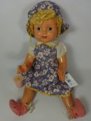 Mid 20th Century composition doll with sleeping eyes and blonde wig Condition Report