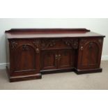 Victorian mahogany sideboard enclosed by four panelled doors, central drawer, carved mounts, W202cm,