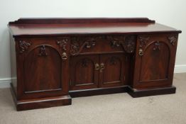 Victorian mahogany sideboard enclosed by four panelled doors, central drawer, carved mounts, W202cm,