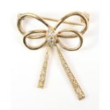 9ct gold diamond set bow brooch with tremblant diamond ribbons hallmarked Condition