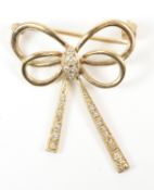 9ct gold diamond set bow brooch with tremblant diamond ribbons hallmarked Condition