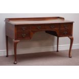 Early 20th century walnut kneehole dressing/writing table, five drawers, W130cm, H81cm,