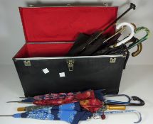 Umbrella with silver hallmarked handle and other Vintage umbrellas in hard case and collection of