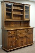 Ercol golden dawn dresser, four drawers and cupboards,