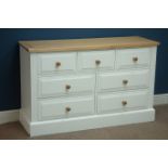 White painted seven drawer chest with light oak top, W130cm, H81cm,