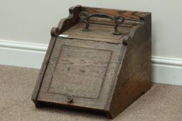Late 19th century oak coal scuttle with Art Nouveau handle, with liner,
