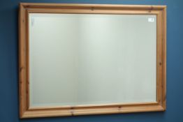 Pine framed wall mirror, bevelled glass,