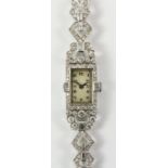 1940's cocktail watch set with baguette and round diamonds stamped platinum WATCHES - as we are not