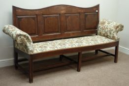 18th century oak panelled shaped top back settle, with mahogany inlay,