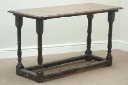 Early 18th century country oak stretcher joint table base, turned legs, with later rectangular top,