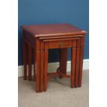 Cherry wood nest of three tables, smaller table with single drawer,