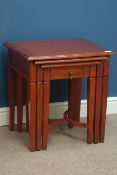 Cherry wood nest of three tables, smaller table with single drawer,