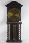 Early 20th century oak cased barley twist aneroid barometer with mercury thermometer,