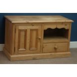 Waxed pine television cabinet, panelled cupboard and drawer, W102cm, H61cm,