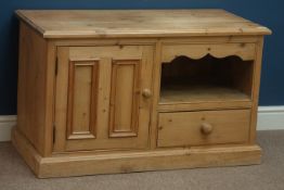 Waxed pine television cabinet, panelled cupboard and drawer, W102cm, H61cm,