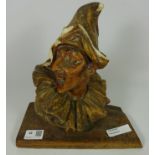 Pottery bust of a pierrot / performer signed on back G.