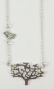 Pendant necklace in the form of a tree and bird stamped 925 Condition Report <a