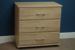 Oak finish three drawer chest (W78cm, H77cm, D42cm), and matching bedside chest (W42cm, H77cm,