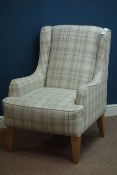 Wingback armchair upholstered in checkered fabric,