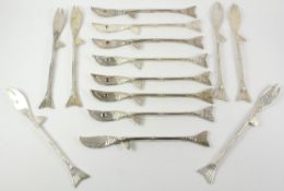 Contemporary designer 8 fish knives and 6 forks modelled as fish,