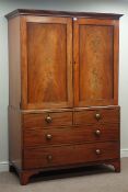 Early 19th century mahogany linen press, two figured panelled doors enclosing linen slides,