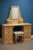 Pine twin pedestal dressing table, eight drawers, raised mirror back with two drawers and stool,