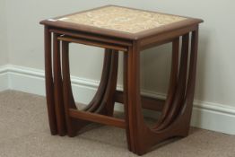 G-Plan nest of three 'Astro' tables, one with tiled top, 50cm x 50cm,