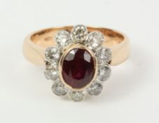 Ruby and diamond gold cluster ring hallmarked 18ct Condition Report <a