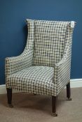 Edwardian upholstered wing back armchair,