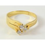 Contemporary gold ring set with three diamonds stamped 14K Condition Report <a