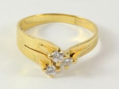 Contemporary gold ring set with three diamonds stamped 14K Condition Report <a