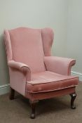 Mid to late 20th century 'Parker Knoll' walnut framed wingback upholstered armchair