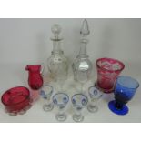 Set of four 20th Century liqueur glasses with etched and blue overlay decoration,