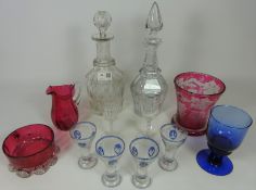 Set of four 20th Century liqueur glasses with etched and blue overlay decoration,