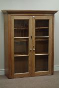 Late 19th century pitch pine glazed bookcase, adjustable shelves, W112cm, H137cm,