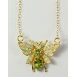 Peridot and opal butterfly silver-gilt pendant necklace Condition Report <a