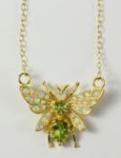 Peridot and opal butterfly silver-gilt pendant necklace Condition Report <a