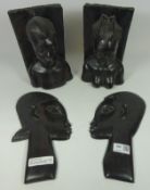 Pair carved wood West African book ends and a pair of African wall heads (4) Condition