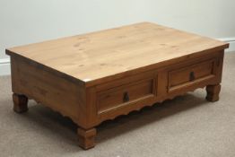 Rectangular pine coffee table with four drawers, 76cm x 120cm,