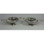 Pair of Arts and Crafts beaten silver-plated bonbon dishes, D16.