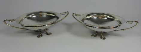 Pair of Arts and Crafts beaten silver-plated bonbon dishes, D16.