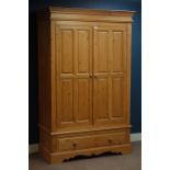 Solid pine double wardrobe enclosed by two panelled doors with drawer to base, W125cm, H199cm,