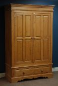 Solid pine double wardrobe enclosed by two panelled doors with drawer to base, W125cm, H199cm,